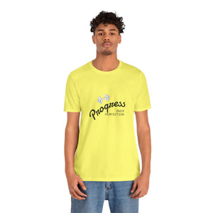 A man wearing a bright yellow t-shirt with a black and white graphic that reads 'Progress OVER PERFECTION' with a dumbbell illustration, paired with blue jeans, against a plain white background | AH Urban Wear PK