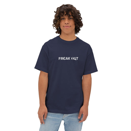 Person wearing a navy blue drop shoulder t-shirt with 'freak out' text on a white background l AH Urban Wear