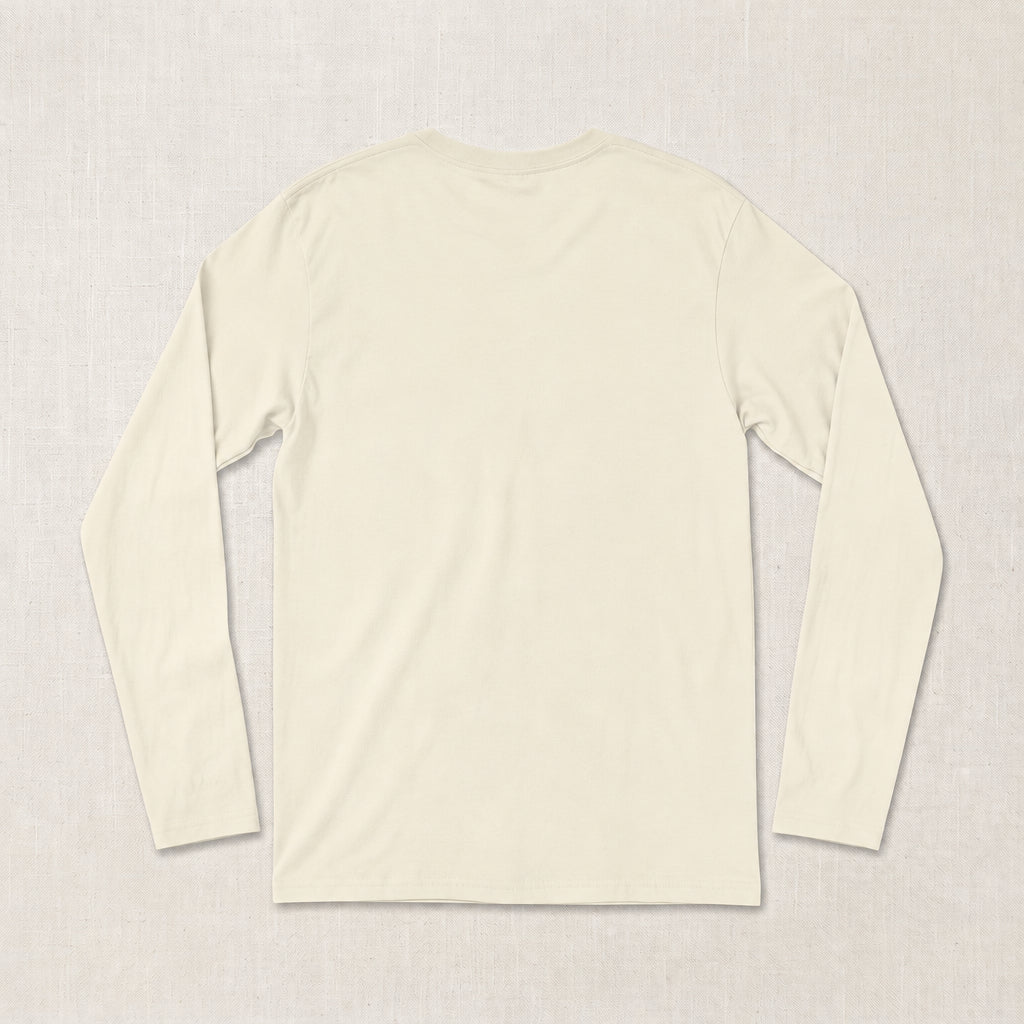 A plain cream-colored long-sleeve t-shirt shown from the back, laid flat on a textured light beige fabric background l AH Urban Wear