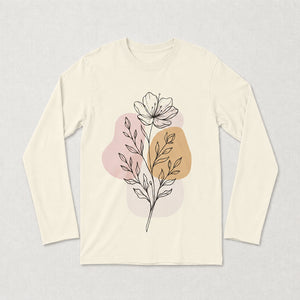 An off-white long-sleeve crewneck t-shirt featuring a central graphic of a black line-drawn flower and leaves layered over abstract pastel pink and tan shapes, displayed flat against a textured light beige background l AH Urban Wear