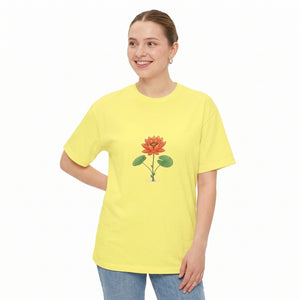 A woman modeling a bright yellow drop shoulder t-shirt with a graphic of an orange lotus flower and green leaves on the chest, set against a plain white background l AH Urban Wear