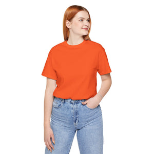 women wearing a plain orange t-shirt with a logo and blue jeans on a white background | AH Urban Wear PK